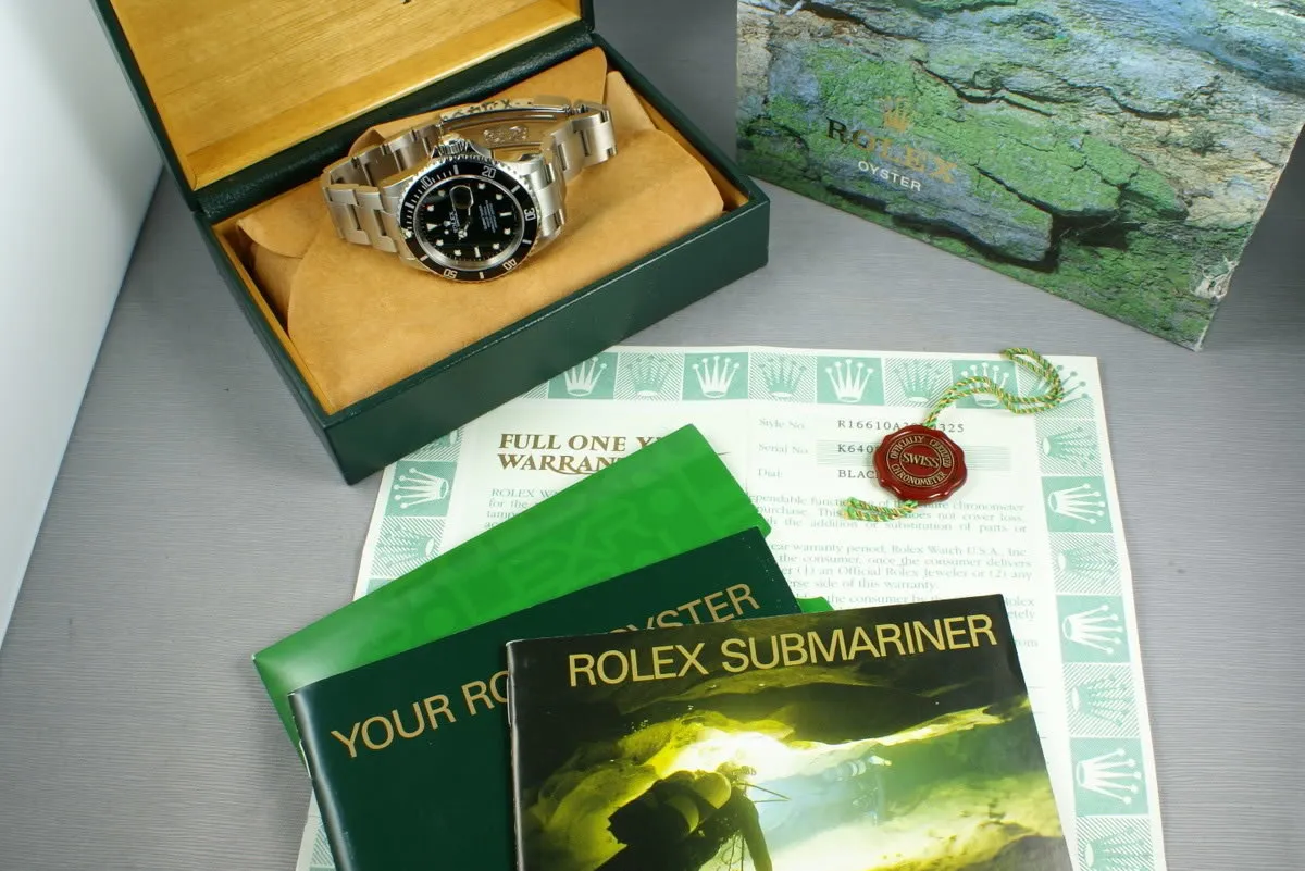 Rolex Submariner 16610 with box and papers K serial