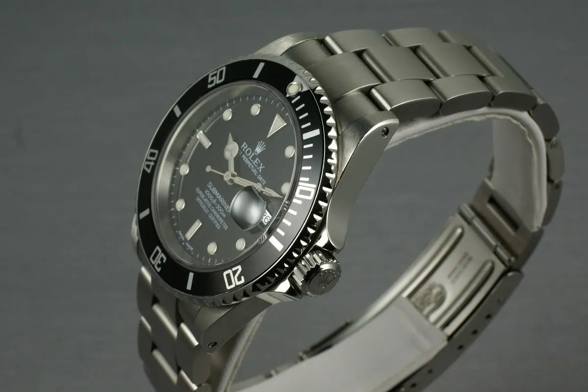 Rolex Submariner 16610 with box and papers K serial