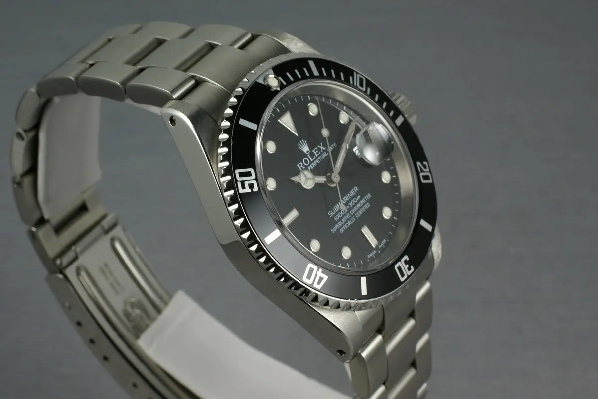 Rolex Submariner 16610 with box and papers K serial