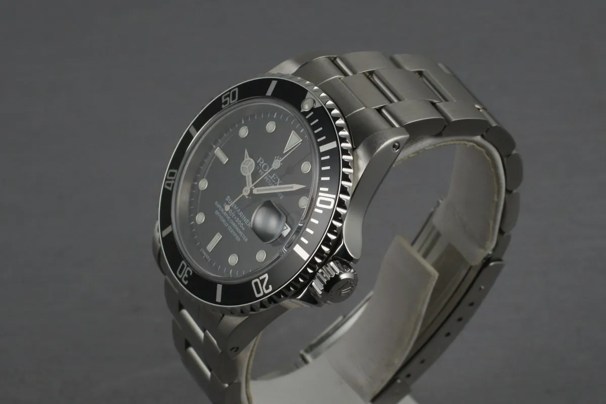 Rolex Submariner 16610 with Box and Papers