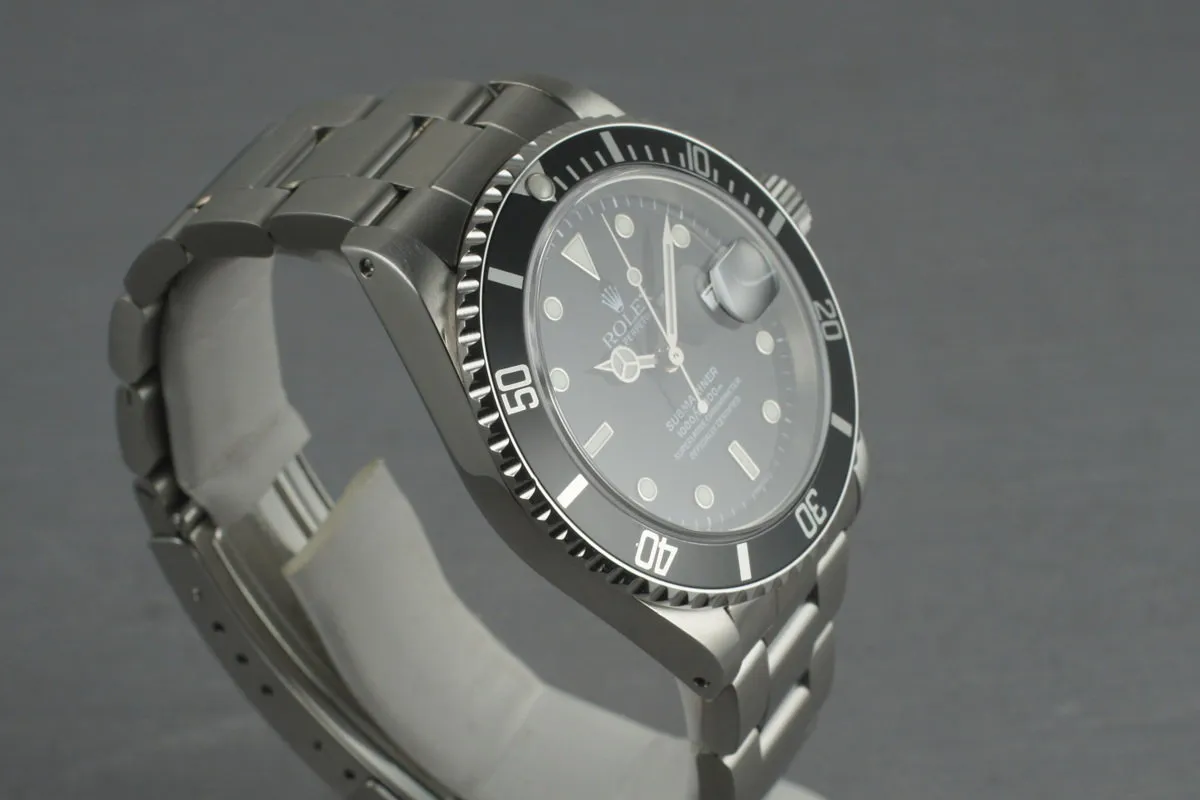Rolex Submariner 16610 with Box and Papers