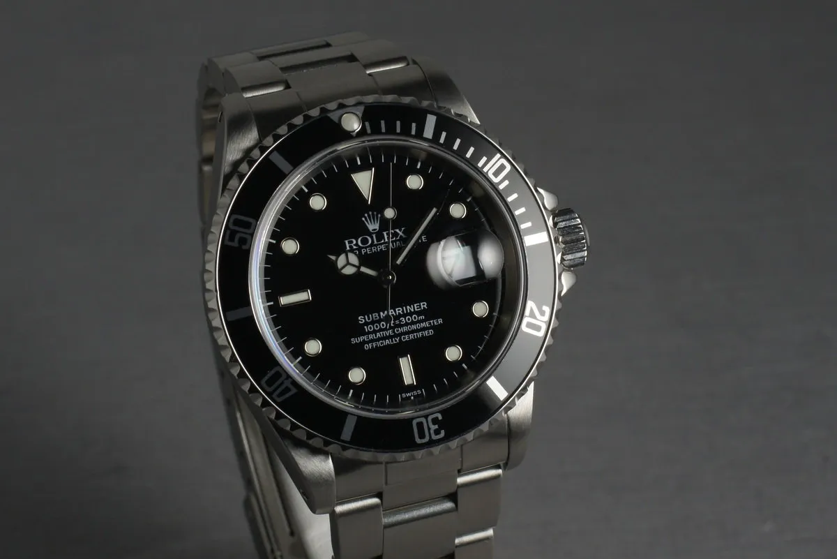 Rolex Submariner 16610 with Box and Papers